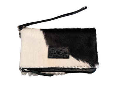 Fold over cowhide clutch