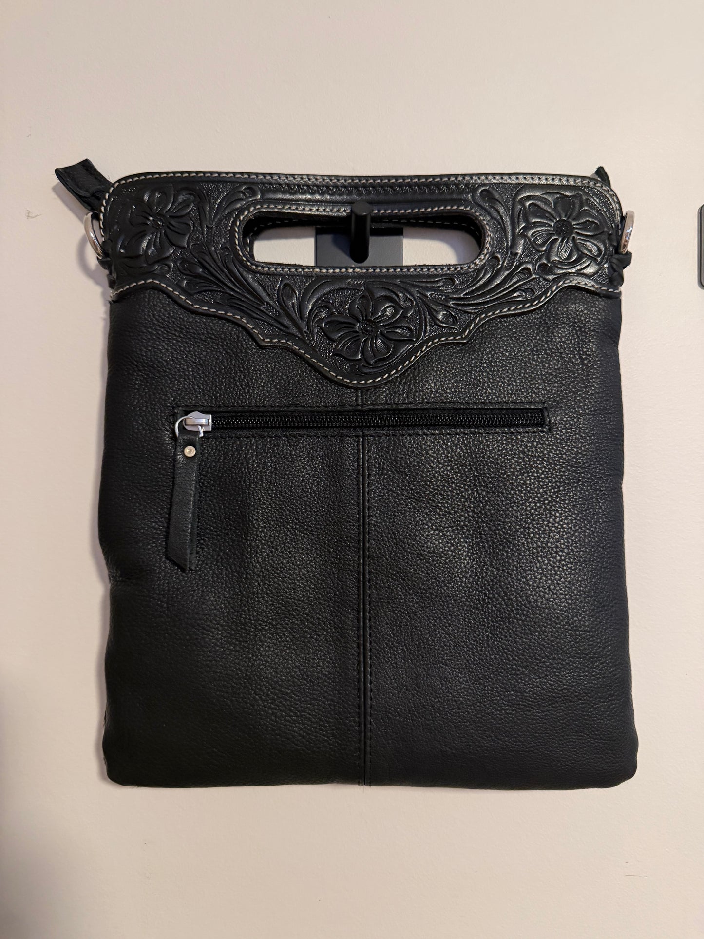 Tooled cowhide bag