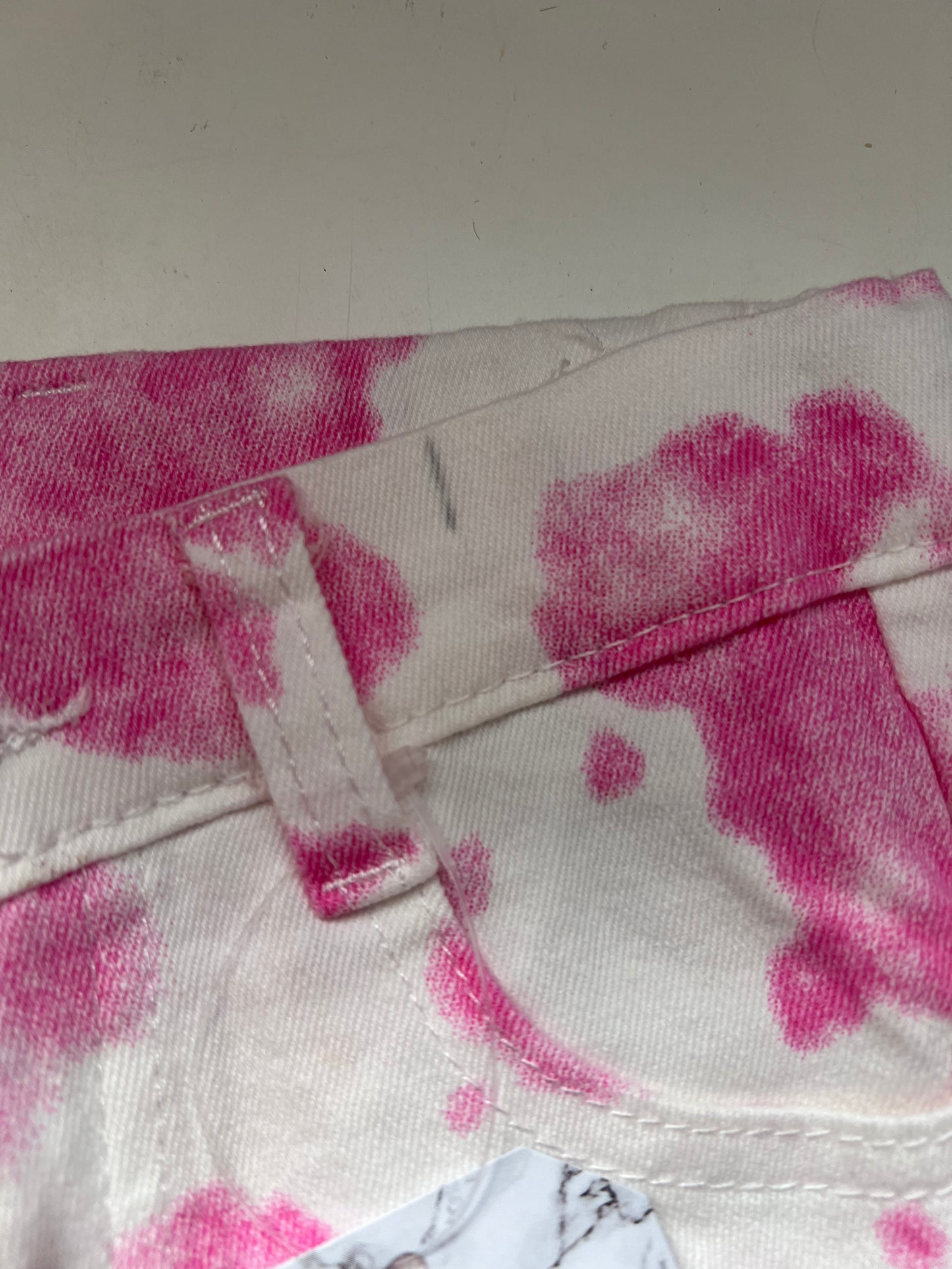 SECONDS - Kids pink cow print flare jeans SIZE 3-6 MONTHS