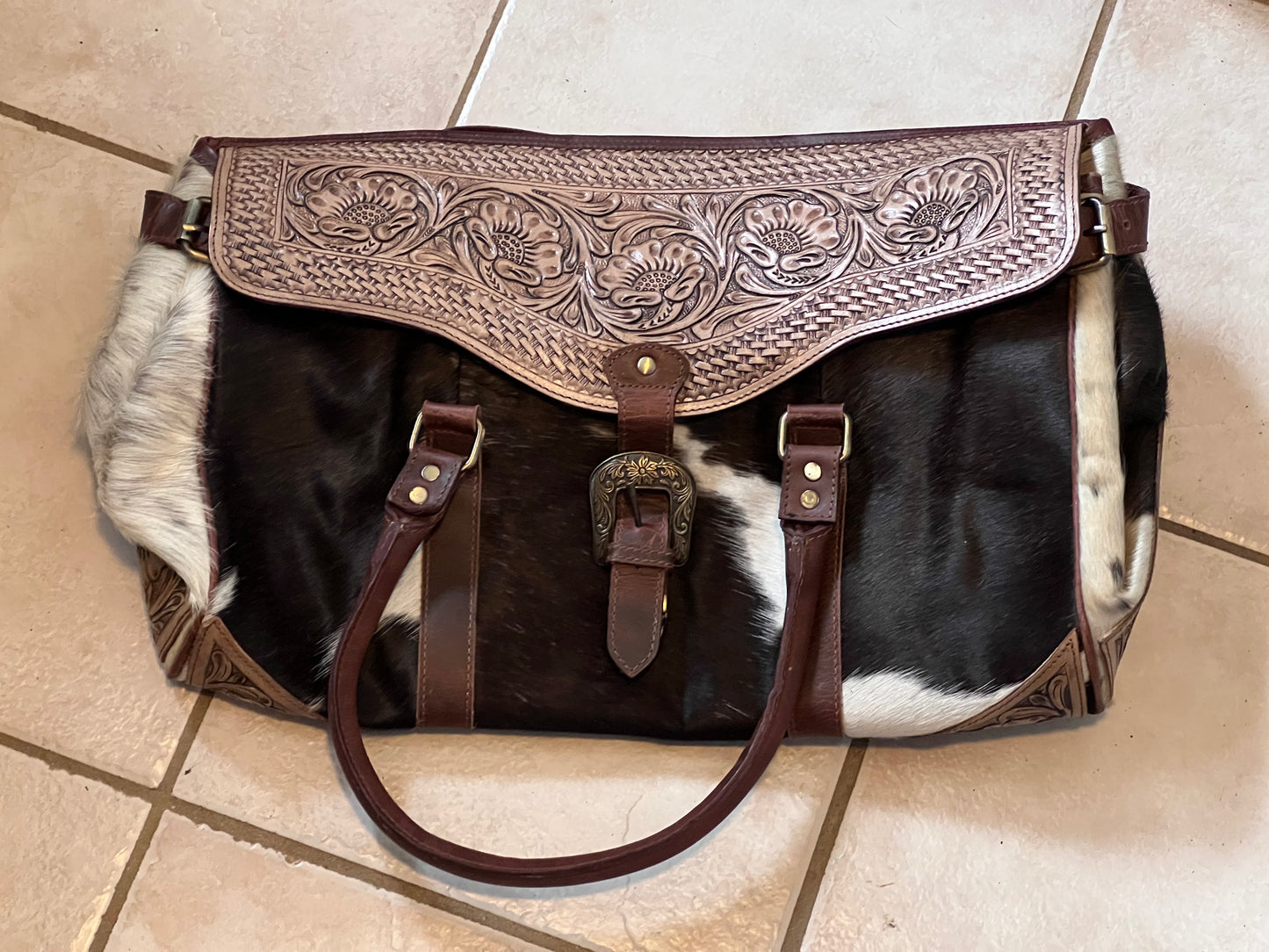 Tooled cowhide duffle bag